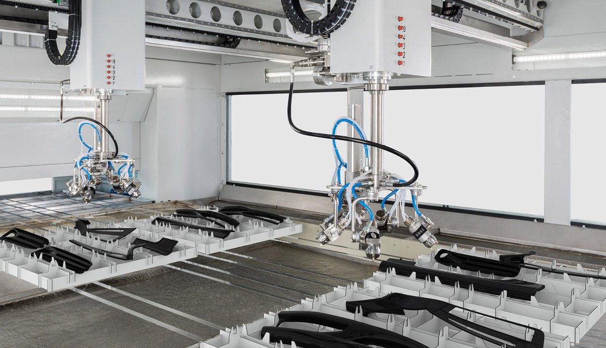 soluzione con linea flatbed per verniciare parti automotive